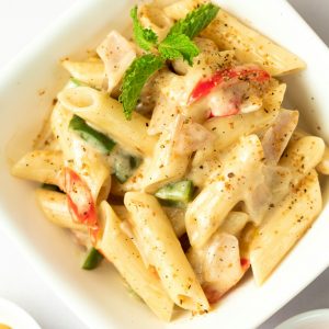 sauced penne pasta dish on bowl